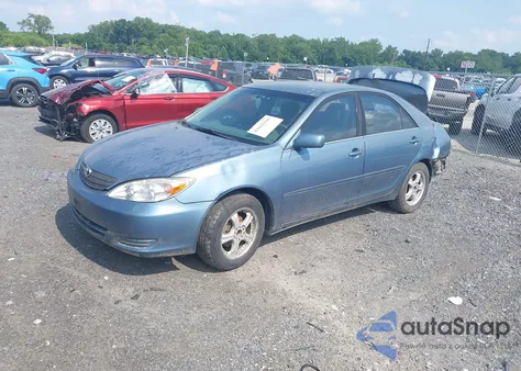 2002 Toyota Camry Le from USA, damaged, VIN 4T1BE32K12U526705